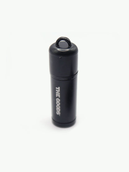 The Goods Phone Lighter, a black USB-C model with loop, branded “THE GOODS,” shown on a white background.