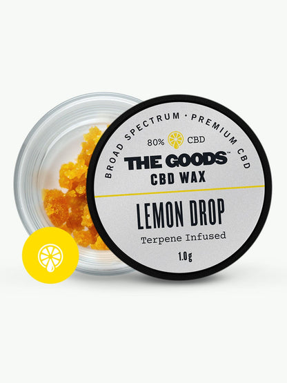 Open jar of The Goods LEMON DROP CBD WAX CRUMBLE UK, yellow terpene-infused 1g, 80% CBD concentrate inside.